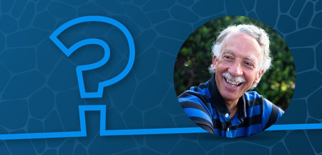 Headshot of Joe Beechem with a large question mark.